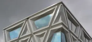 Het Laboratorium voor Infectieziekten in Groningen is ontworpen door DeZwarteHond. De composiet gevelelementen, geproduceerd door Polux en Rollecate, zijn 7,2 x 3,6 m en verbeelden de schematische vorm van een virus • Foto Gerard van Beek.