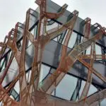 Gevel van bomen in cortenstaal Graafschap College