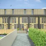 Houten woningen in voormalig Sportfondsenbad Schiedam