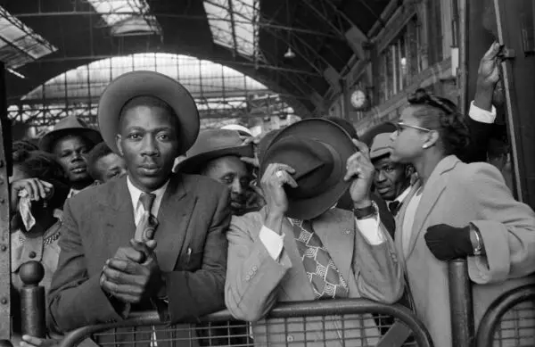 West Indian immigrants arrive at Victoria Station, London, after their journey from Southampton Docks.  Original Publication: Picture Post - 8405 - Thirty Thousand Colour Problems - pub. 1956 (Photo by Haywood Magee/Picture Post/Hulton Archive/Getty Images)