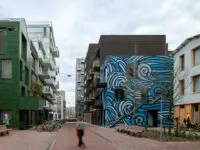 In Amsterdam Buiksloterham groeit een voormalig industrieel havengebied uit tot een circulaire, gemengde stadswijk: Cityplot Buiksloterham.